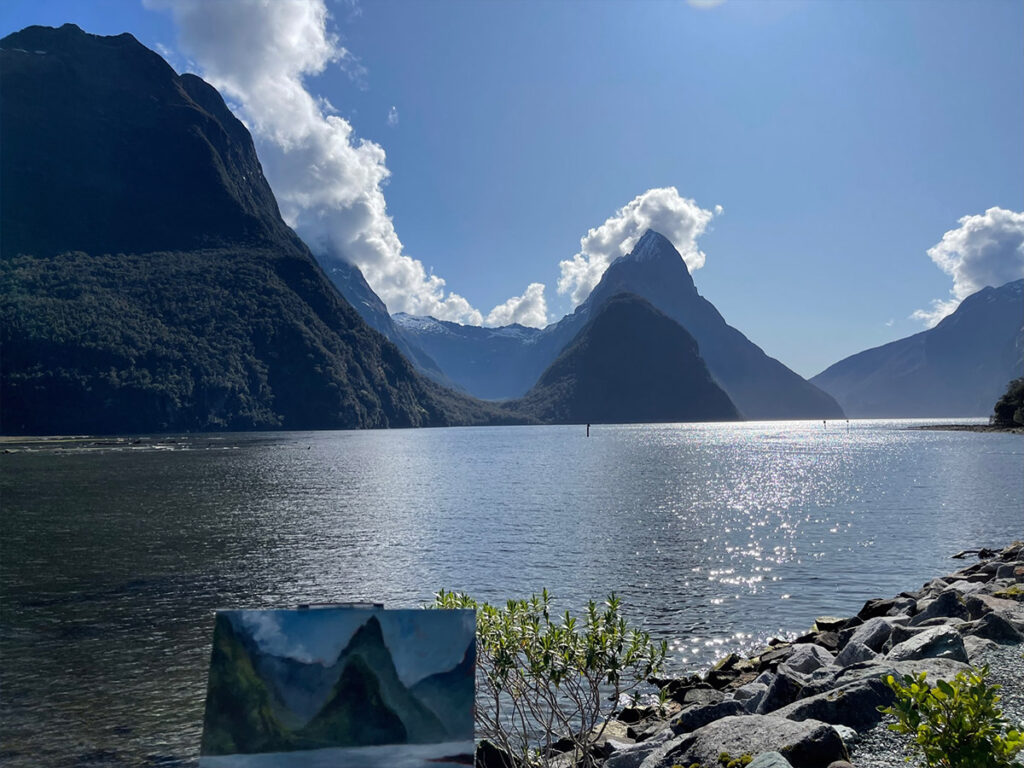 Artist Elizabeth Reed painting Mitre Point in Milford Sound