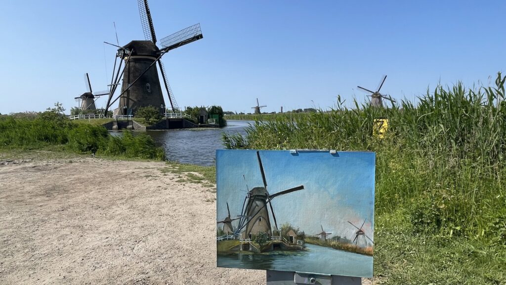 Artist Elizabeth Reed painting at Kinderdijk